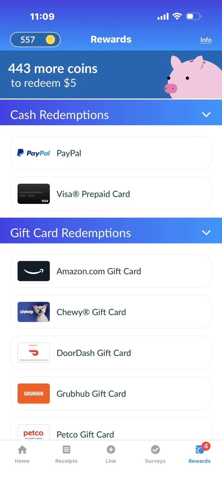 Receipt Hog Rewards screen showing a 557-coin balance, 443 more coins needed to redeem $5, and PayPal, Visa prepaid and gift-card redemption options.